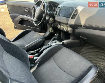 Черный Мицубиси Аутлендер, объемом двигателя 2.36 л и пробегом 244 тыс. км за 9850 $, фото 22 на Automoto.ua