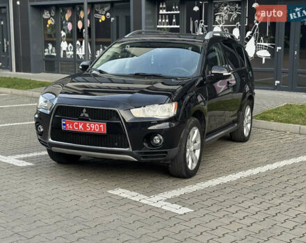 Черный Мицубиси Аутлендер, объемом двигателя 2.2 л и пробегом 225 тыс. км за 10950 $, фото 2 на Automoto.ua