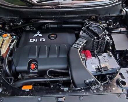 Черный Мицубиси Аутлендер, объемом двигателя 2 л и пробегом 210 тыс. км за 10600 $, фото 31 на Automoto.ua