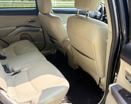 Черный Мицубиси Аутлендер, объемом двигателя 2.4 л и пробегом 275 тыс. км за 12000 $, фото 12 на Automoto.ua