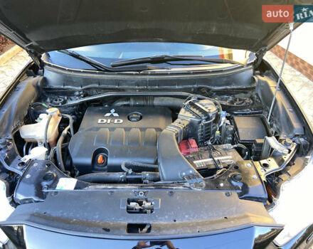 Черный Мицубиси Аутлендер, объемом двигателя 1.97 л и пробегом 292 тыс. км за 10900 $, фото 8 на Automoto.ua