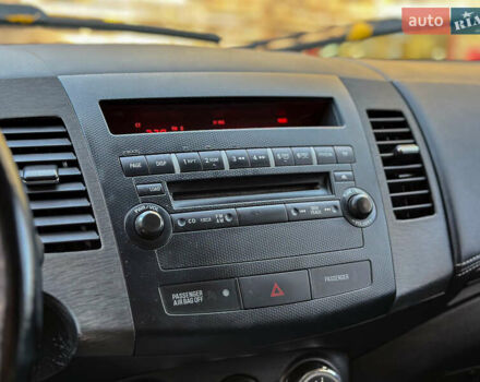 Черный Мицубиси Аутлендер, объемом двигателя 2.2 л и пробегом 226 тыс. км за 11500 $, фото 68 на Automoto.ua