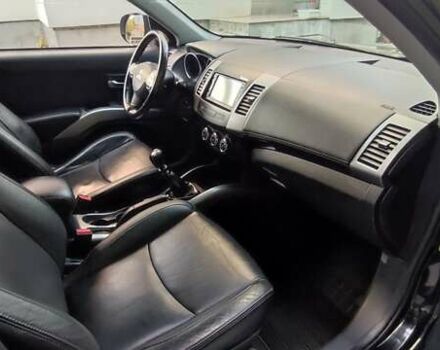 Черный Мицубиси Аутлендер, объемом двигателя 2 л и пробегом 210 тыс. км за 10600 $, фото 16 на Automoto.ua