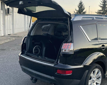 Черный Мицубиси Аутлендер, объемом двигателя 0 л и пробегом 257 тыс. км за 10399 $, фото 28 на Automoto.ua