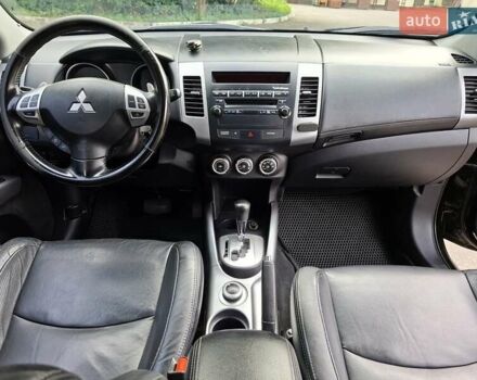 Мицубиси Аутлендер 2010 в Чернигове на Automoto.ua Черный Мицубиси Аутлендер, объемом двигателя 2.4 л и пробегом 180 тыс. км за 11500 $, фото 11 на Automoto.ua
