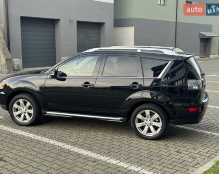 Черный Мицубиси Аутлендер, объемом двигателя 2.2 л и пробегом 225 тыс. км за 10950 $, фото 22 на Automoto.ua