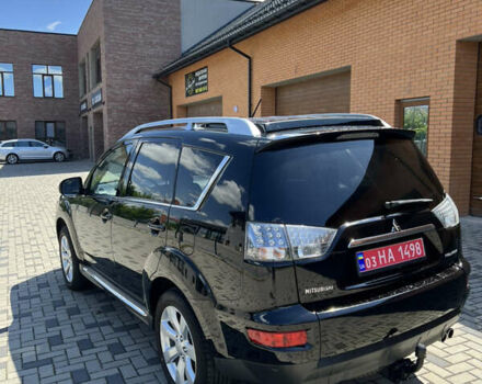 Чорний Міцубісі Аутлендер, об'ємом двигуна 2.2 л та пробігом 214 тис. км за 10600 $, фото 9 на Automoto.ua