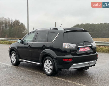 Черный Мицубиси Аутлендер, объемом двигателя 2.2 л и пробегом 227 тыс. км за 10700 $, фото 4 на Automoto.ua