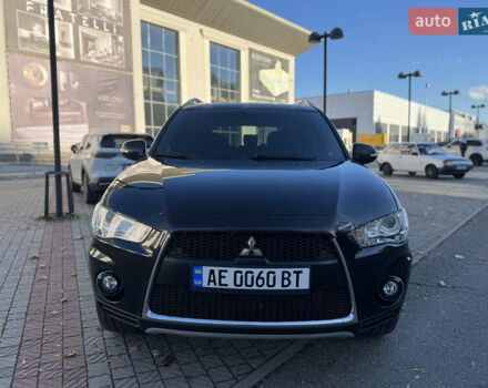 Черный Мицубиси Аутлендер, объемом двигателя 3 л и пробегом 162 тыс. км за 10800 $, фото 1 на Automoto.ua
