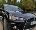 Чорний Міцубісі Аутлендер, об'ємом двигуна 2.3 л та пробігом 245 тис. км за 10150 $, фото 7 на Automoto.ua