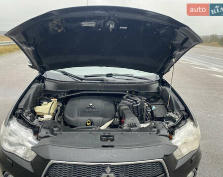 Черный Мицубиси Аутлендер, объемом двигателя 2.2 л и пробегом 227 тыс. км за 10700 $, фото 42 на Automoto.ua