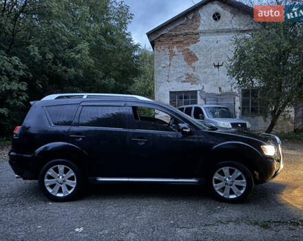 Чорний Міцубісі Аутлендер, об'ємом двигуна 2 л та пробігом 258 тис. км за 8699 $, фото 15 на Automoto.ua