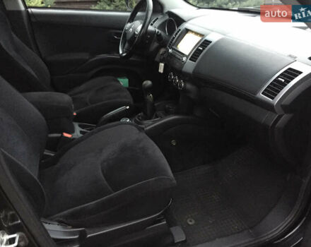 Черный Мицубиси Аутлендер, объемом двигателя 2.36 л и пробегом 315 тыс. км за 9700 $, фото 11 на Automoto.ua