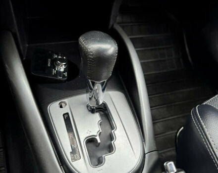 Чорний Міцубісі Аутлендер, об'ємом двигуна 2 л та пробігом 228 тис. км за 10550 $, фото 23 на Automoto.ua