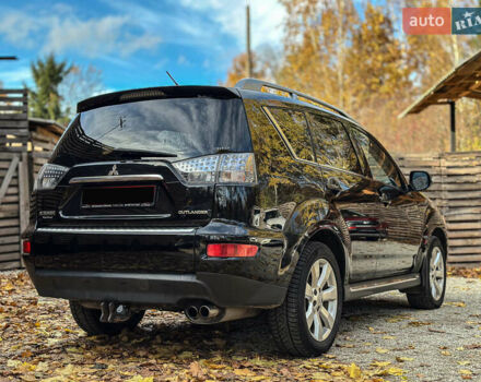 Черный Мицубиси Аутлендер, объемом двигателя 2.2 л и пробегом 226 тыс. км за 11500 $, фото 21 на Automoto.ua