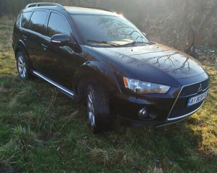 Черный Мицубиси Аутлендер, объемом двигателя 2 л и пробегом 261 тыс. км за 9700 $, фото 3 на Automoto.ua