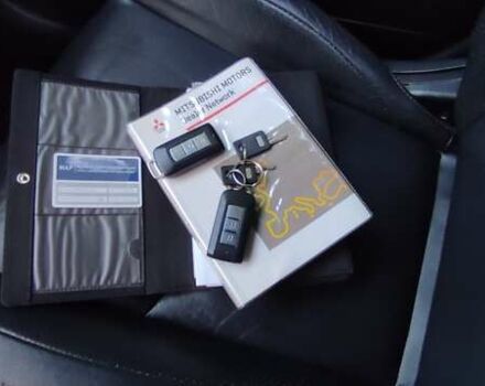 Черный Мицубиси Аутлендер, объемом двигателя 2 л и пробегом 210 тыс. км за 10600 $, фото 28 на Automoto.ua