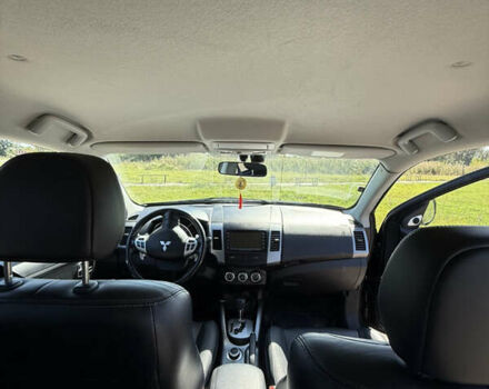 Чорний Міцубісі Аутлендер, об'ємом двигуна 2.36 л та пробігом 235 тис. км за 12500 $, фото 20 на Automoto.ua