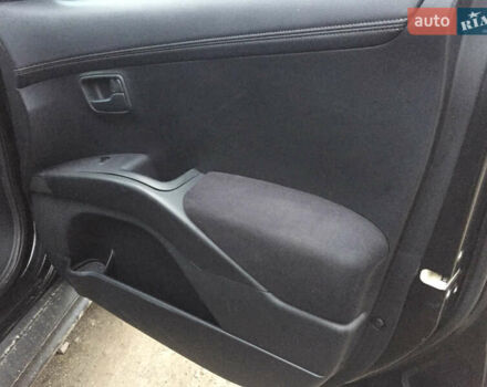 Черный Мицубиси Аутлендер, объемом двигателя 2.36 л и пробегом 315 тыс. км за 9700 $, фото 13 на Automoto.ua