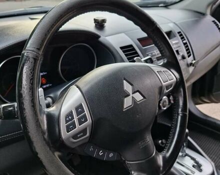 Мицубиси Аутлендер 2010 в Чернигове на Automoto.ua Черный Мицубиси Аутлендер, объемом двигателя 2.4 л и пробегом 180 тыс. км за 11500 $, фото 13 на Automoto.ua