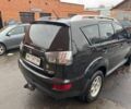 Черный Мицубиси Аутлендер, объемом двигателя 2.4 л и пробегом 305 тыс. км за 10000 $, фото 2 на Automoto.ua