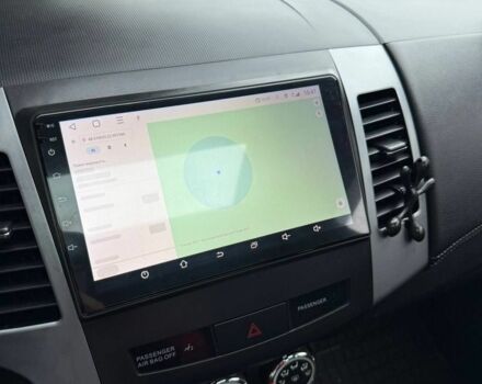 Чорний Міцубісі Аутлендер, об'ємом двигуна 2 л та пробігом 210 тис. км за 10700 $, фото 4 на Automoto.ua