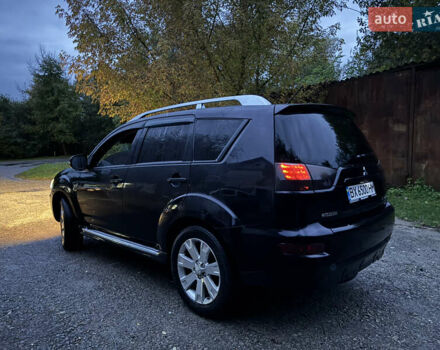 Чорний Міцубісі Аутлендер, об'ємом двигуна 2 л та пробігом 258 тис. км за 8699 $, фото 18 на Automoto.ua
