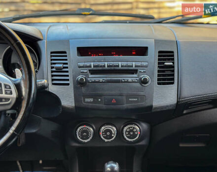 Черный Мицубиси Аутлендер, объемом двигателя 2.2 л и пробегом 226 тыс. км за 11500 $, фото 85 на Automoto.ua