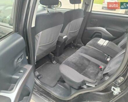 Чорний Міцубісі Аутлендер, об'ємом двигуна 2 л та пробігом 226 тис. км за 10750 $, фото 14 на Automoto.ua