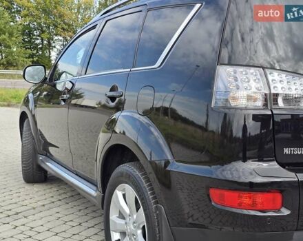 Мицубиси Аутлендер 2010 в Калуше на Automoto.ua Черный Мицубиси Аутлендер, объемом двигателя 1.97 л и пробегом 270 тыс. км за 11700 $, фото 13 на Automoto.ua