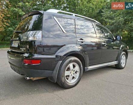 Мицубиси Аутлендер 2010 в Чернигове на Automoto.ua Черный Мицубиси Аутлендер, объемом двигателя 2.4 л и пробегом 180 тыс. км за 11500 $, фото 7 на Automoto.ua