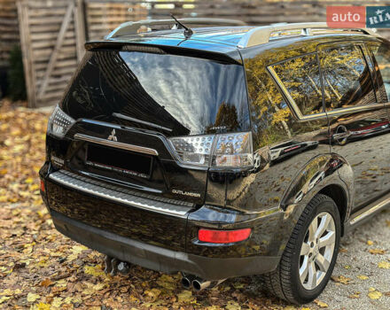 Черный Мицубиси Аутлендер, объемом двигателя 2.2 л и пробегом 226 тыс. км за 11500 $, фото 41 на Automoto.ua