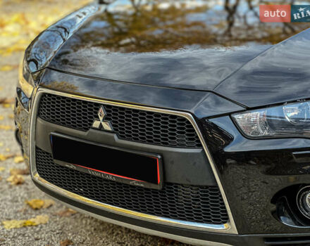 Черный Мицубиси Аутлендер, объемом двигателя 2.2 л и пробегом 226 тыс. км за 11500 $, фото 45 на Automoto.ua