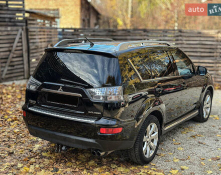 Черный Мицубиси Аутлендер, объемом двигателя 2.2 л и пробегом 226 тыс. км за 11500 $, фото 23 на Automoto.ua