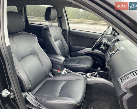 Черный Мицубиси Аутлендер, объемом двигателя 2.2 л и пробегом 227 тыс. км за 10700 $, фото 35 на Automoto.ua