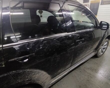 Черный Мицубиси Аутлендер, объемом двигателя 0 л и пробегом 215 тыс. км за 9500 $, фото 11 на Automoto.ua