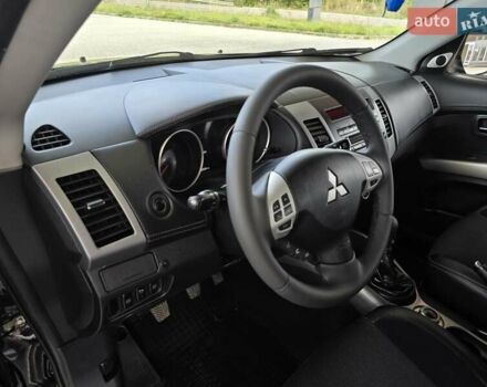 Мицубиси Аутлендер 2010 в Калуше на Automoto.ua Черный Мицубиси Аутлендер, объемом двигателя 1.97 л и пробегом 270 тыс. км за 11700 $, фото 24 на Automoto.ua