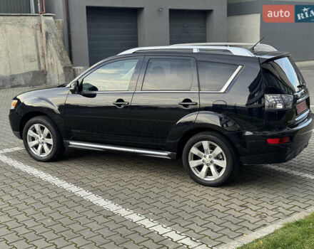 Черный Мицубиси Аутлендер, объемом двигателя 2.2 л и пробегом 225 тыс. км за 10950 $, фото 21 на Automoto.ua