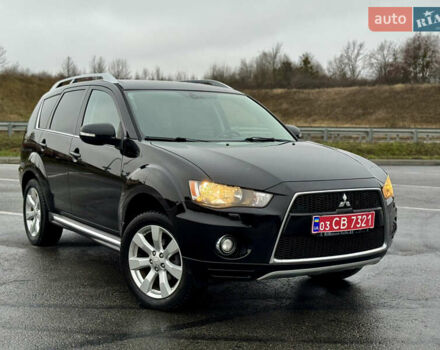 Чорний Міцубісі Аутлендер, об'ємом двигуна 2 л та пробігом 228 тис. км за 10550 $, фото 46 на Automoto.ua