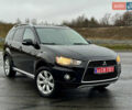 Чорний Міцубісі Аутлендер, об'ємом двигуна 2 л та пробігом 228 тис. км за 10550 $, фото 46 на Automoto.ua