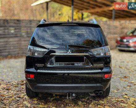 Черный Мицубиси Аутлендер, объемом двигателя 2.2 л и пробегом 226 тыс. км за 11500 $, фото 19 на Automoto.ua
