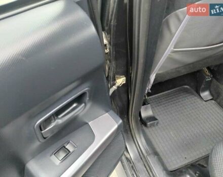 Чорний Міцубісі Аутлендер, об'ємом двигуна 2 л та пробігом 226 тис. км за 10750 $, фото 11 на Automoto.ua
