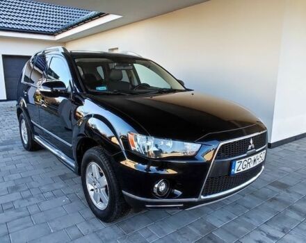 Черный Мицубиси Аутлендер, объемом двигателя 2 л и пробегом 264 тыс. км за 2900 $, фото 1 на Automoto.ua