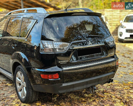 Черный Мицубиси Аутлендер, объемом двигателя 2.2 л и пробегом 226 тыс. км за 11500 $, фото 34 на Automoto.ua