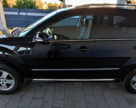 Черный Мицубиси Аутлендер, объемом двигателя 2 л и пробегом 264 тыс. км за 2900 $, фото 3 на Automoto.ua