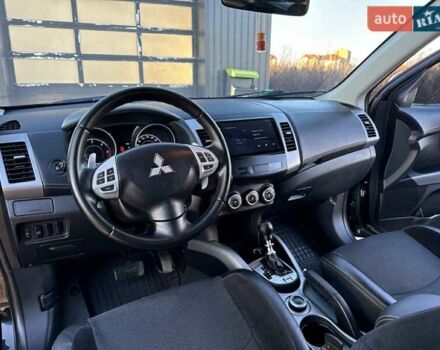 Черный Мицубиси Аутлендер, объемом двигателя 2.2 л и пробегом 264 тыс. км за 10700 $, фото 11 на Automoto.ua
