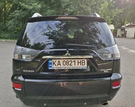 Мицубиси Аутлендер 2010 в Чернигове на Automoto.ua Черный Мицубиси Аутлендер, объемом двигателя 2.4 л и пробегом 180 тыс. км за 11500 $, фото 10 на Automoto.ua