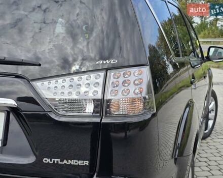 Мицубиси Аутлендер 2010 в Калуше на Automoto.ua Черный Мицубиси Аутлендер, объемом двигателя 1.97 л и пробегом 270 тыс. км за 11700 $, фото 11 на Automoto.ua