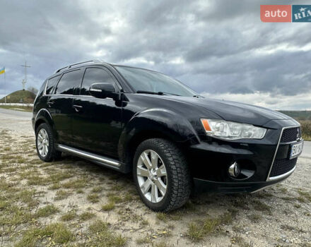 Черный Мицубиси Аутлендер, объемом двигателя 1.97 л и пробегом 224 тыс. км за 9000 $, фото 4 на Automoto.ua