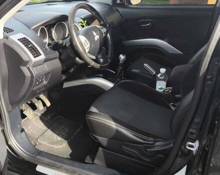 Чорний Міцубісі Аутлендер, об'ємом двигуна 1.97 л та пробігом 282 тис. км за 10900 $, фото 7 на Automoto.ua